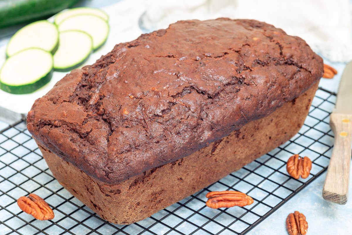 Loaf of chocolate zucchini bread with pecans.
