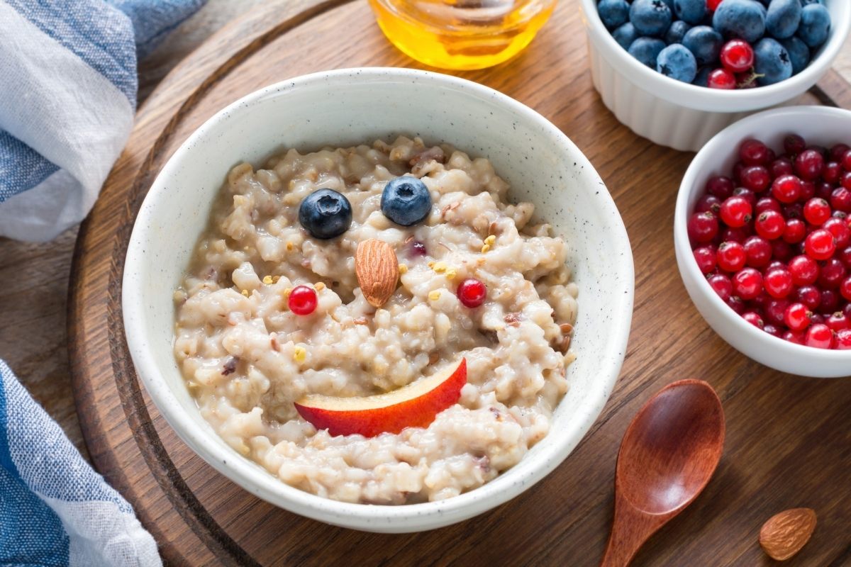 Porridge with fruit, a healthy breakfast for kids and the whole family.