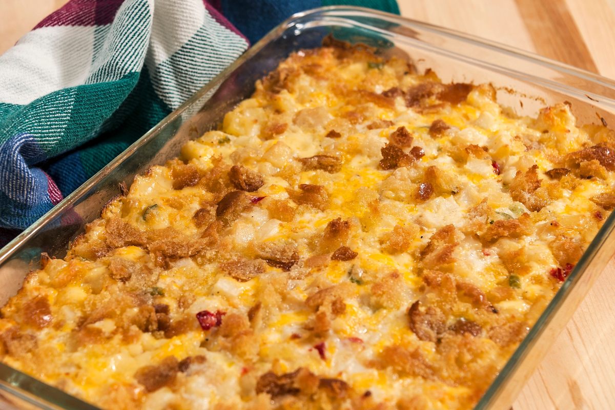 A tray of freshly baked cheesy masheed potato casserole.