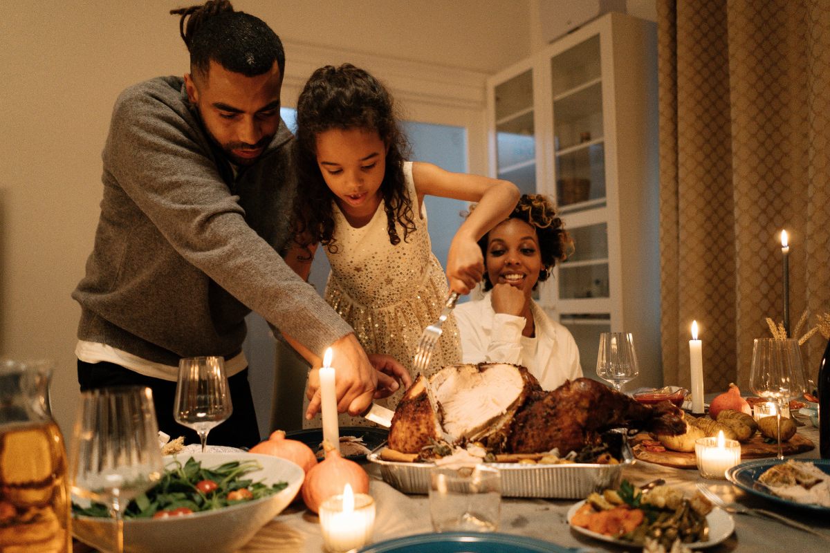 A small family celebrating Thanksgiving.