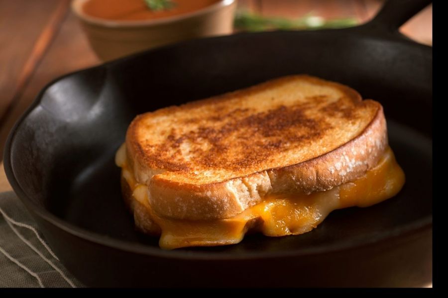 Grilled cheese sandwich on a pan.