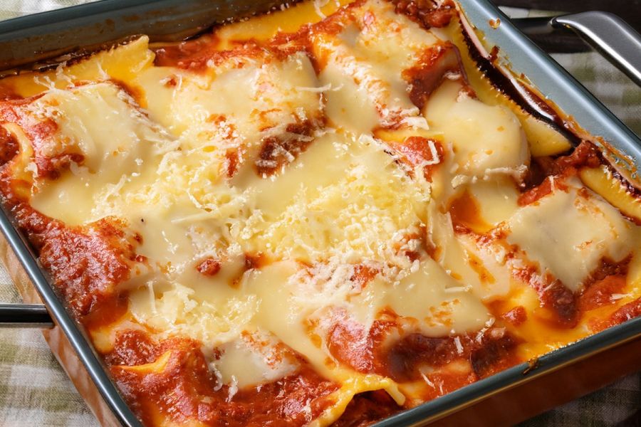 An oven pan with ravioli lasagna.
